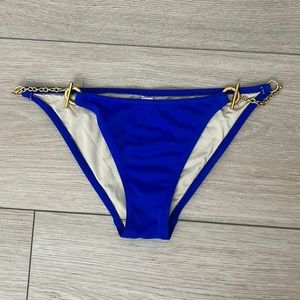 Blue bottom and gold strap